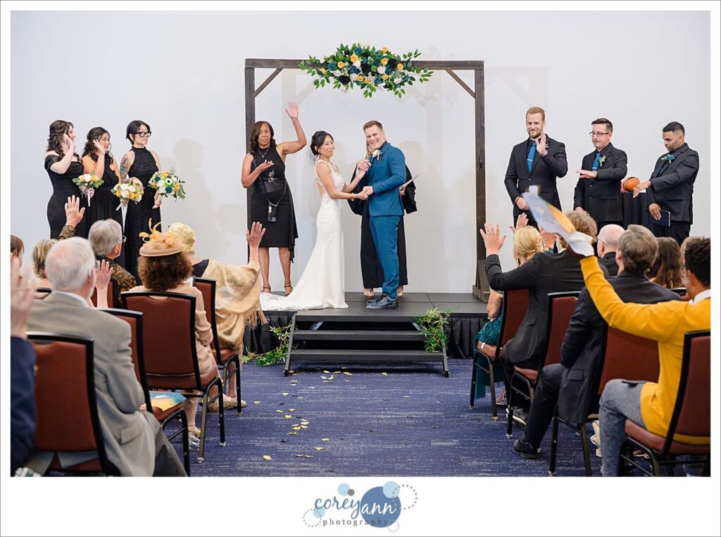indoor wedding ceremony at pro football hall of fame in canton ohio