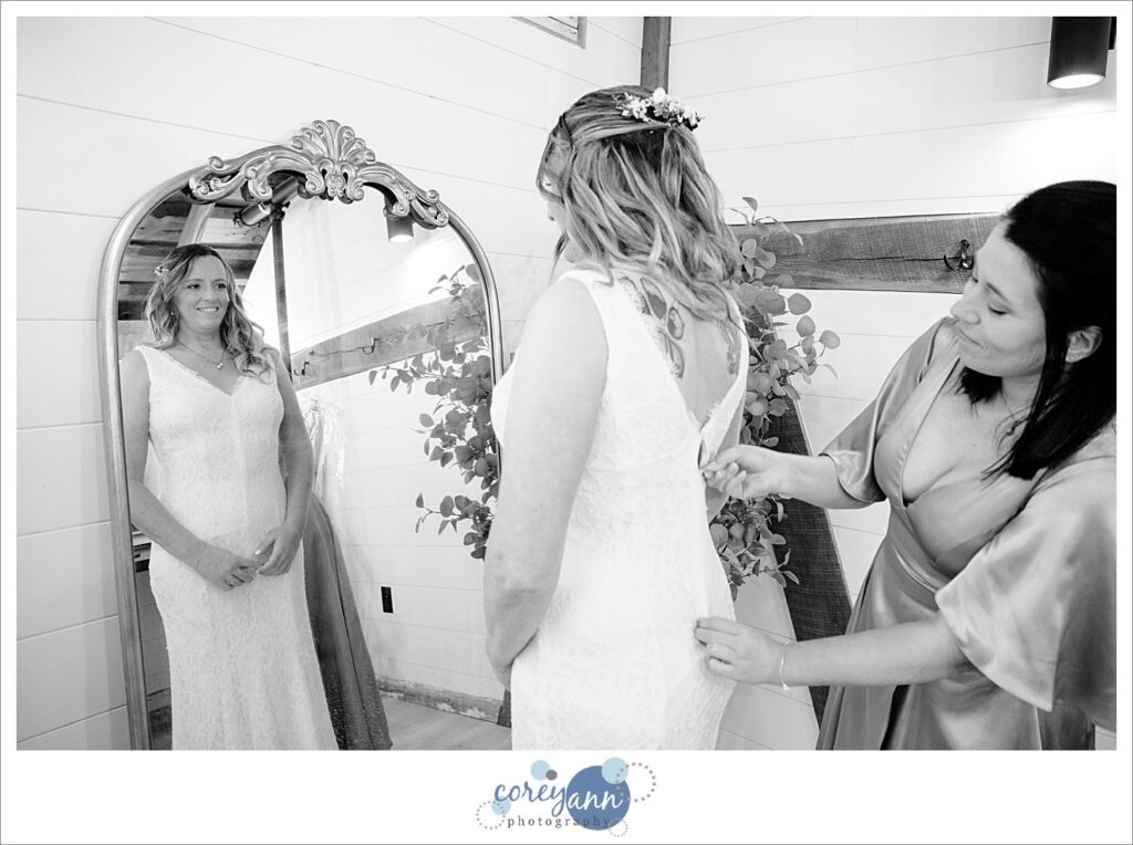 Bride getting ready for wedding at Haymaker's Mill 1875 in North Canton Ohio