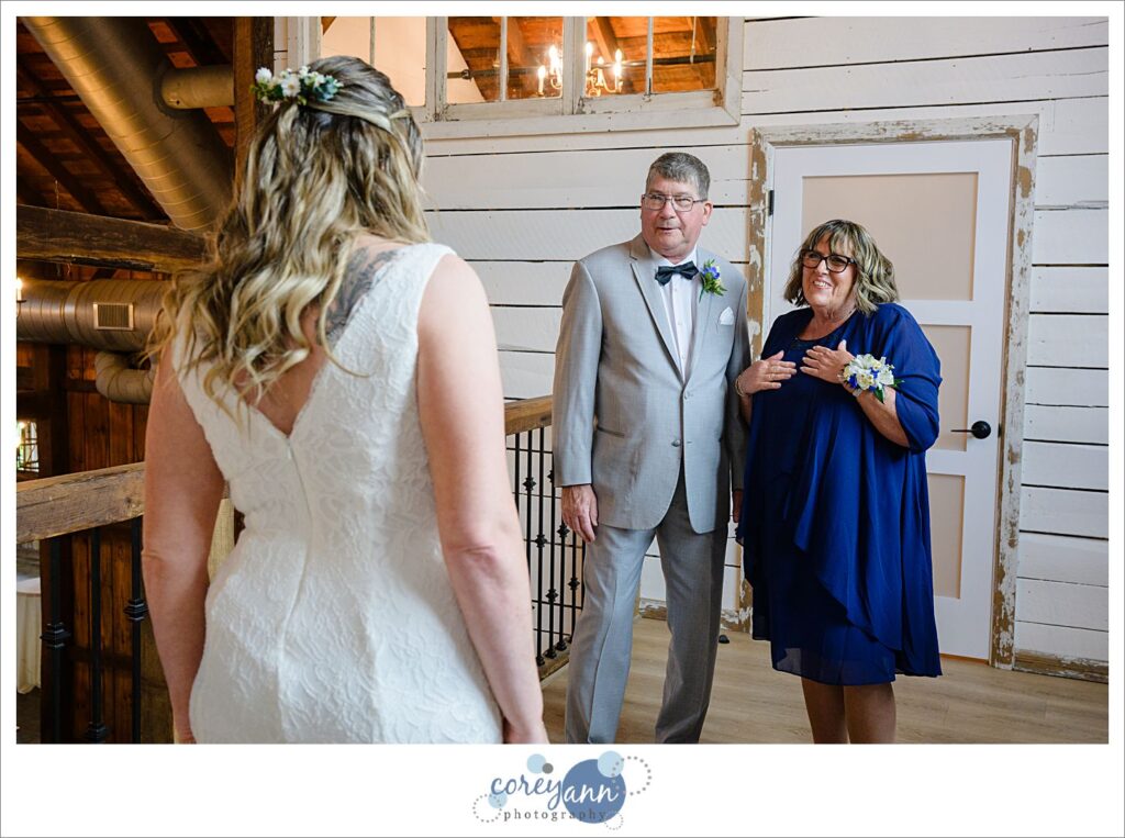 Bride and parents first look before wedding at Haymaker's Mill 1875