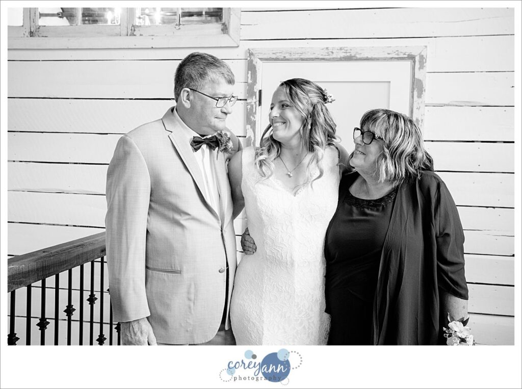 Bride and parents first look before wedding at Haymaker's Mill 1875
