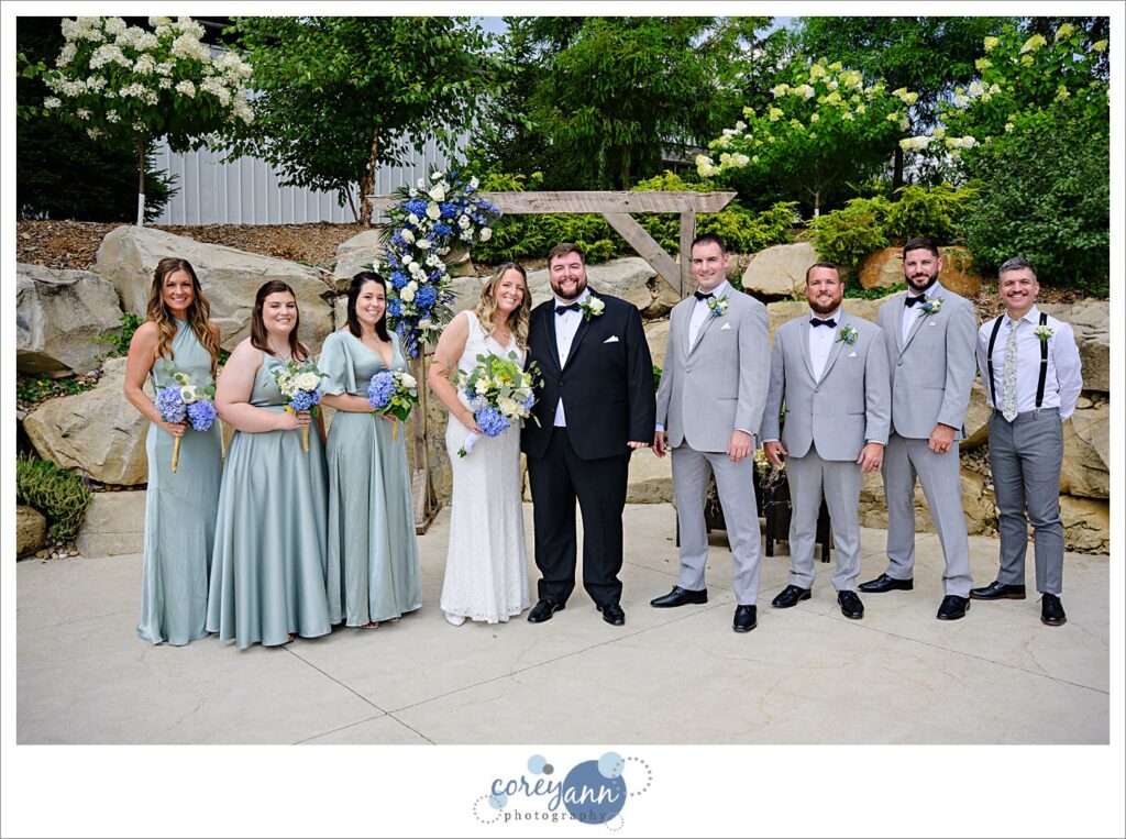 Wedding party portrait on a sunny day at Haymaker's Mill 1875